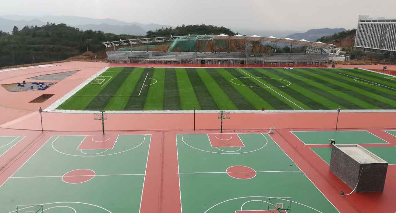 贵州省贵阳一中金塔学校全塑型自结纹+硅PU+人造草